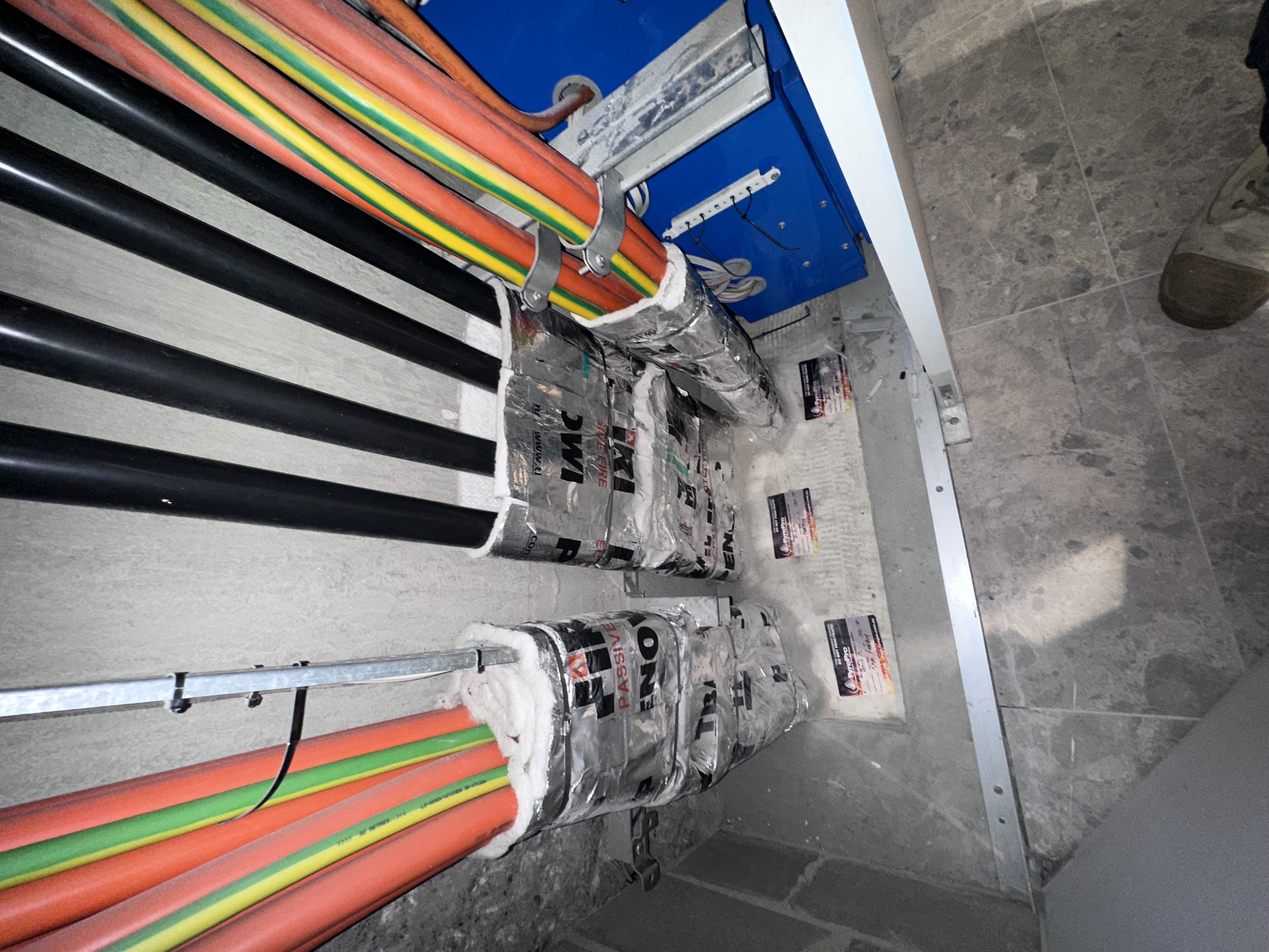 FyrePro technician installing penetration sealing